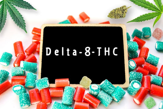 delta 8 tch written on a chalkboard and surrounded by candies